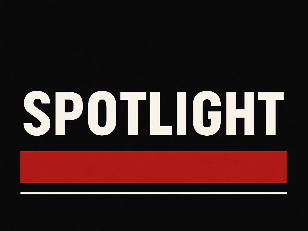 Text graphic that reads 'SPOTLIGHT' with a bold white font on a black background and a red horizontal bar.