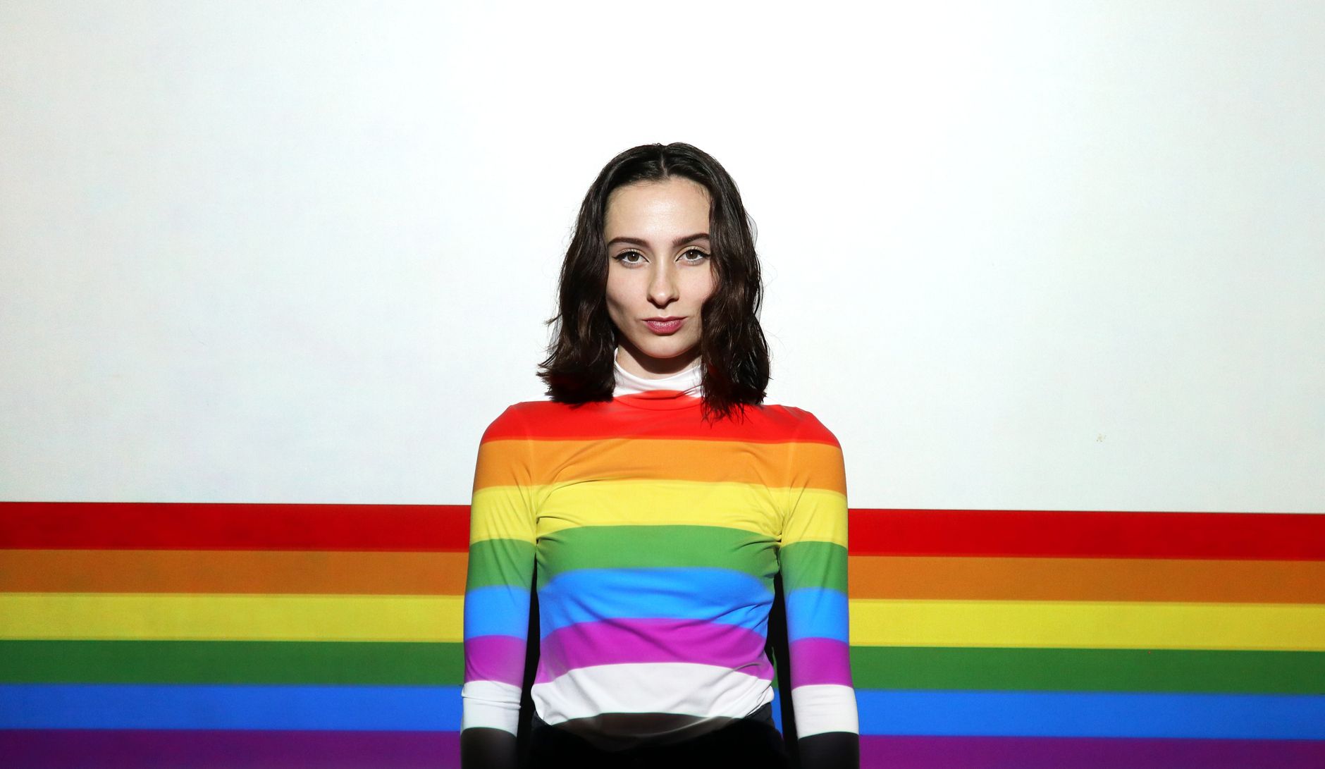 photograph of a woman wearing a colorful shirt