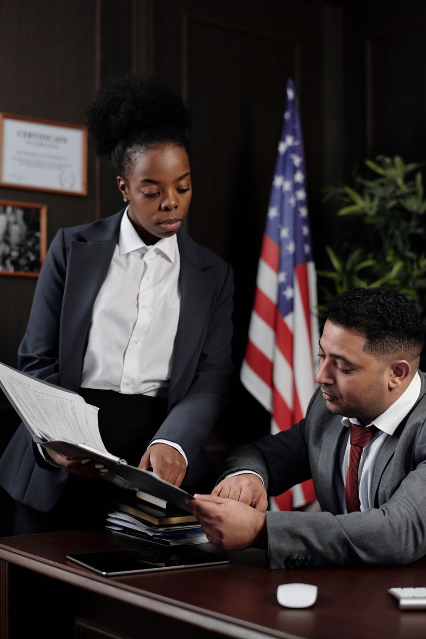 lawyers in an office looking at documents